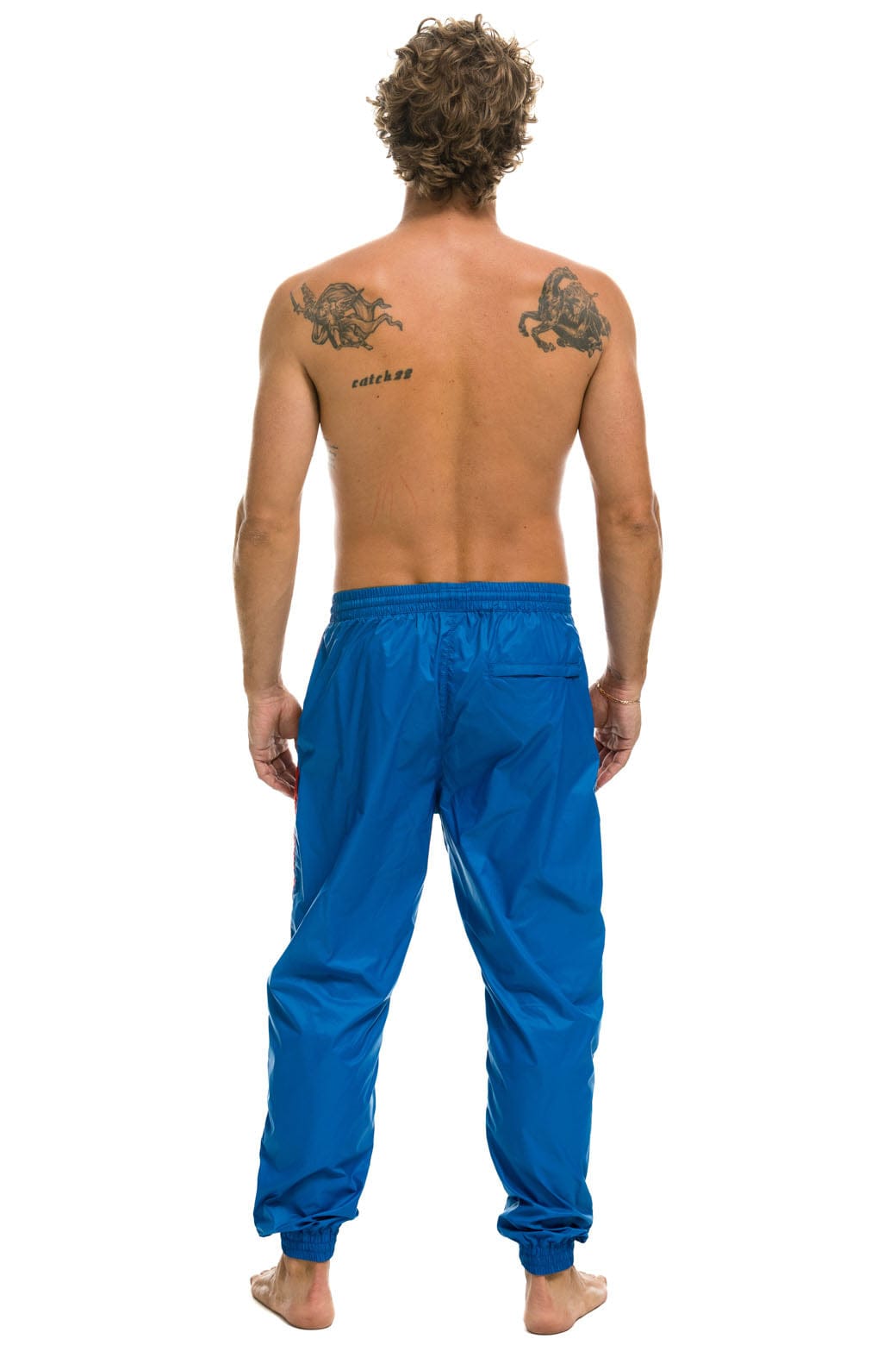 MEN'S 4 STRIPE WIND PANT - SNORKEL BLUE