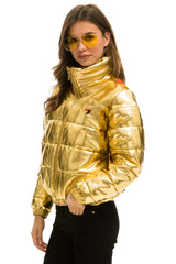 SUNBURST APRES PUFFER JACKET - GLOSSY GOLD